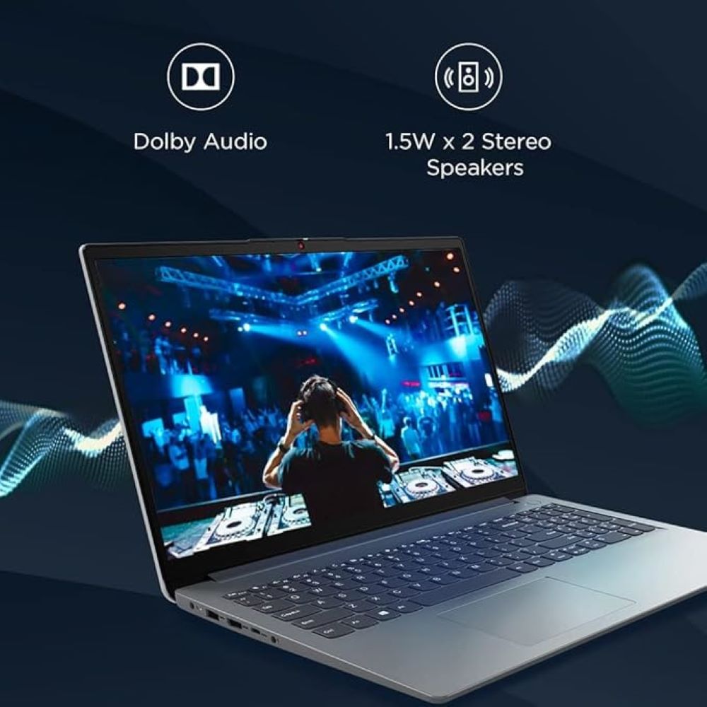 Laptop screen showing a DJ performing live with crowd and stage lights; icons above highlight Dolby Audio and 1.5W x 2 stereo speakers for enhanced sound quality.