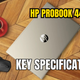 Top view of an HP ProBook 440 G10 laptop on a wooden table, with a mouse, headphones, and a coffee cup, featuring the text 'HP ProBook 440 G10 Key Specifications