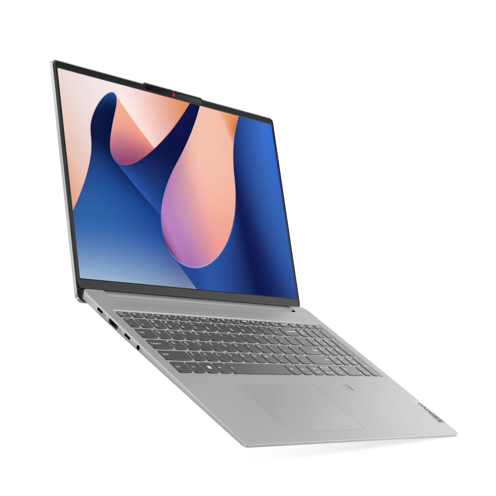 Lenovo Ideapad Slim 3 Arctic Grey laptop with 15.6-inch display, shown open at an angle, featuring slim bezels and a backlit keyboard.